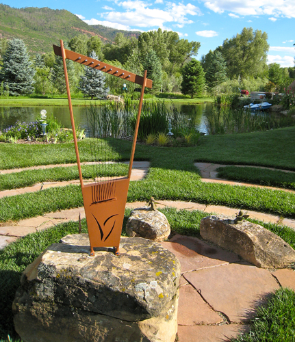 Harmonic Wind Harp Sitting on a Rock